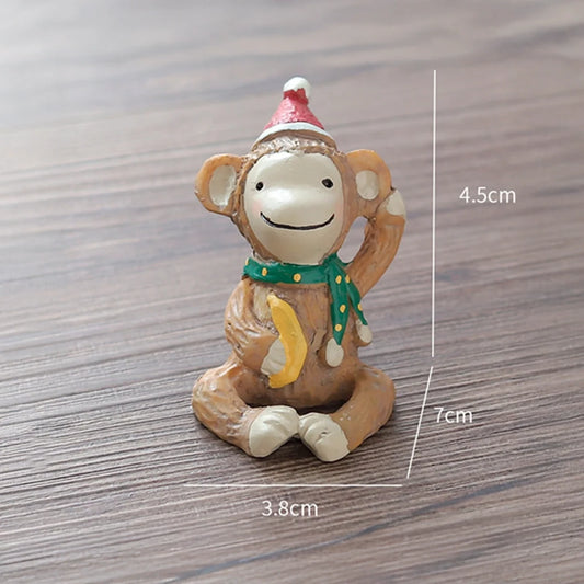 Mini Figura de Mono Navideño – 7 cm